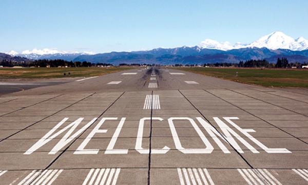 Airport runway with a welcome message