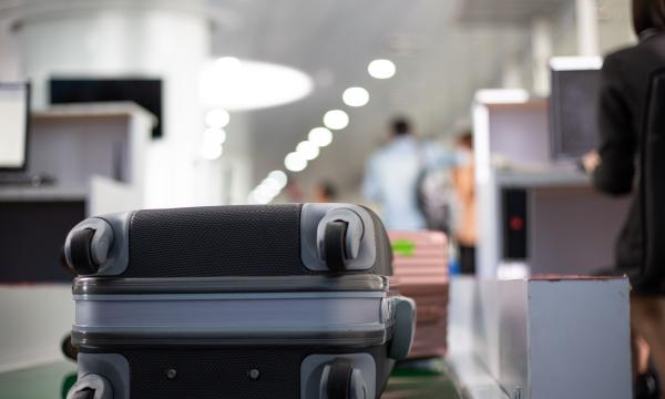 Image of luggage on belt