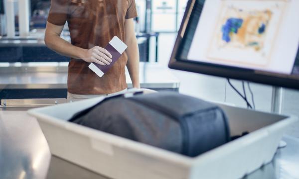 Image of passport and baggage screening